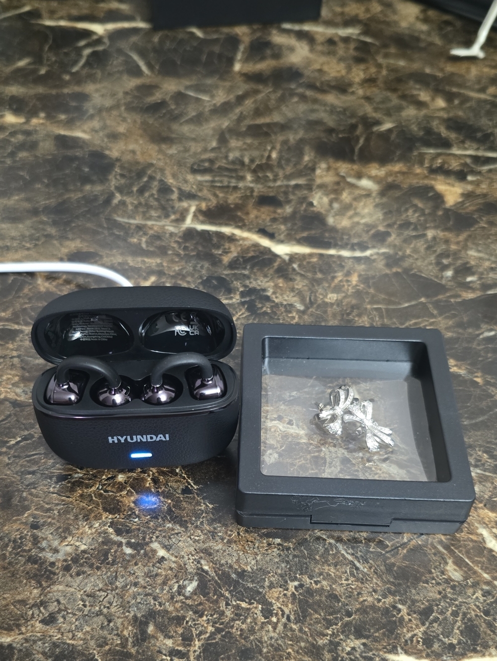 True Wireless Earbuds in Black with Metallic Purple Accents